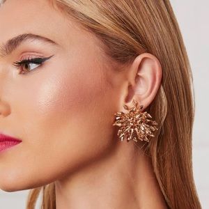 Gold colored earrings